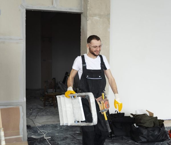 full-shot-man-carrying-ladder